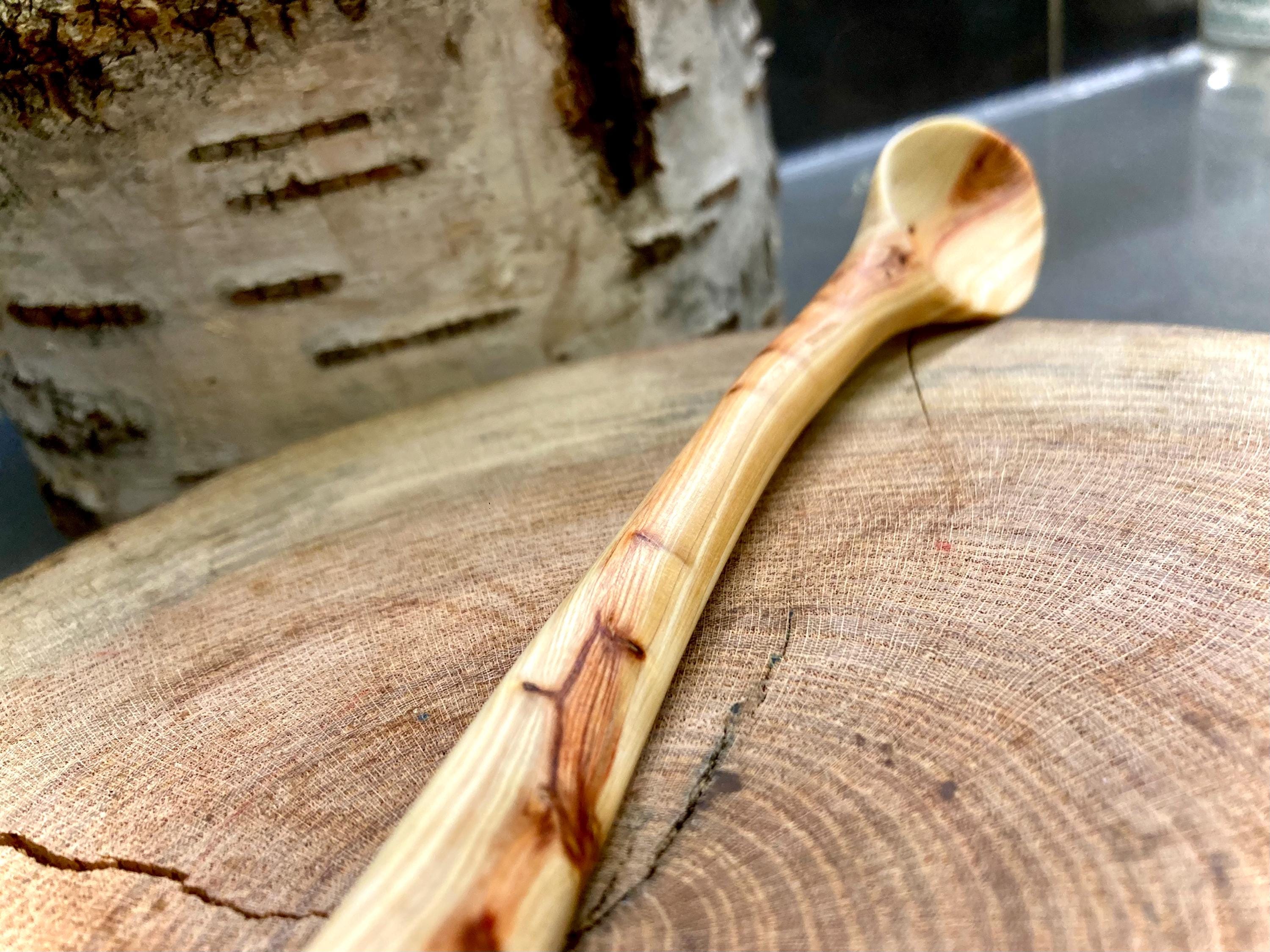 Hand carved juniper spoon